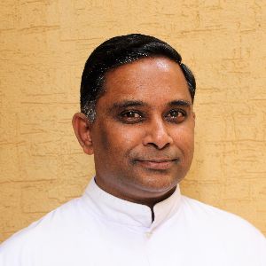 Dr. Martin George, CMF